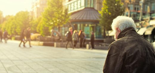 A senior sitting on a bench