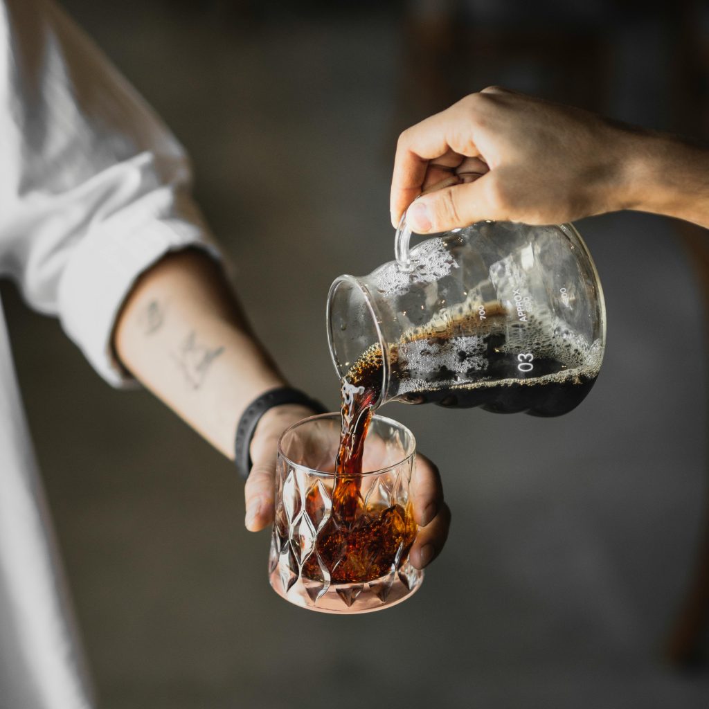 Pouring of cold brew coffee