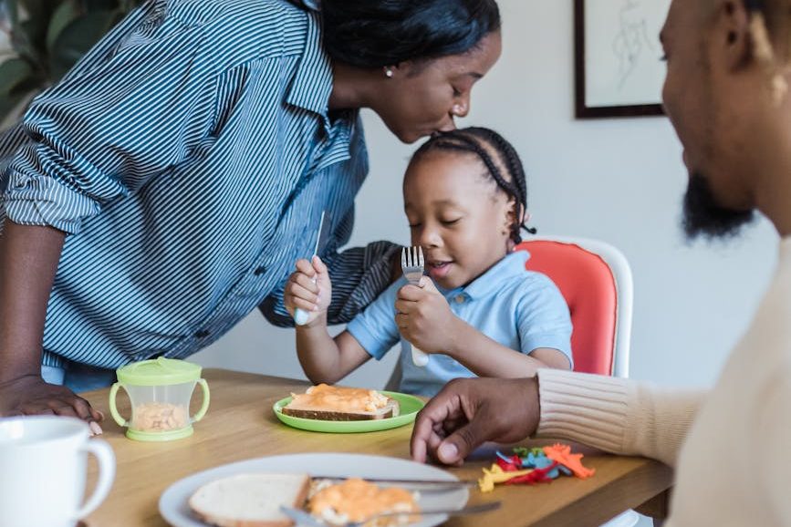 family having breakfast in the kitchen