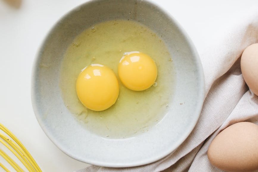 photo of eggs on a ceramic bowl