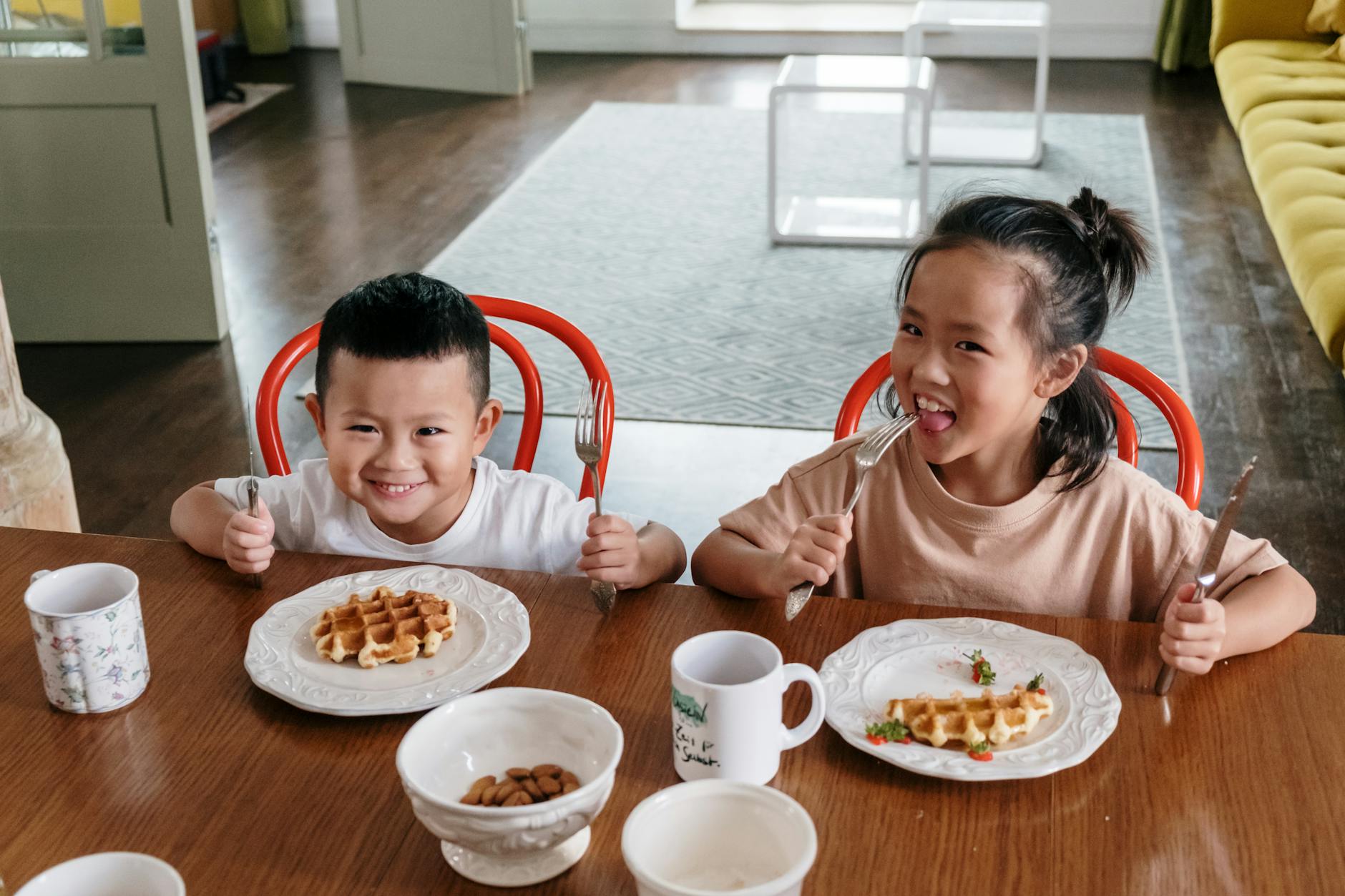 photo of siblings having waffles for breakfast
